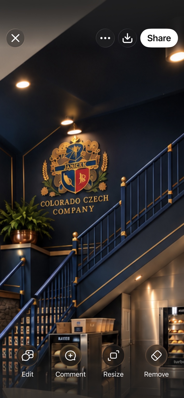 House of Janicek family crest displayed beside a navy and gold staircase